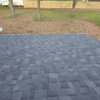 Finished dark architectural shingles on a home in Ashtabula County Ohio